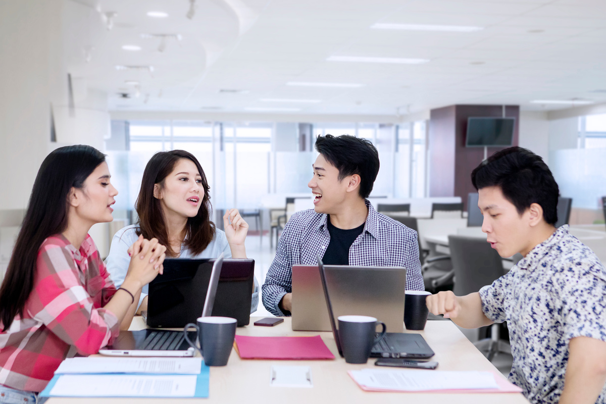 Employees Brainstorming in Office